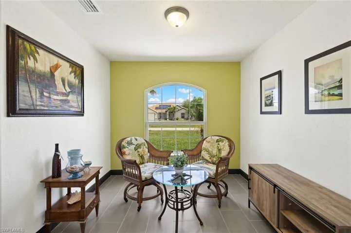 Living area with tile patterned flooring
