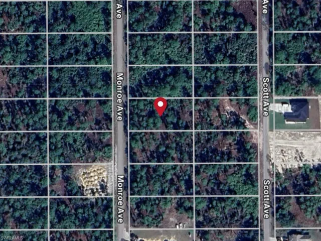 Aerial map of property and surrounding area featuring property boundaries highlighted