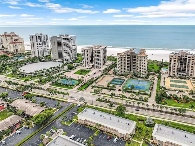 Drone / aerial view with a water view and a view of city