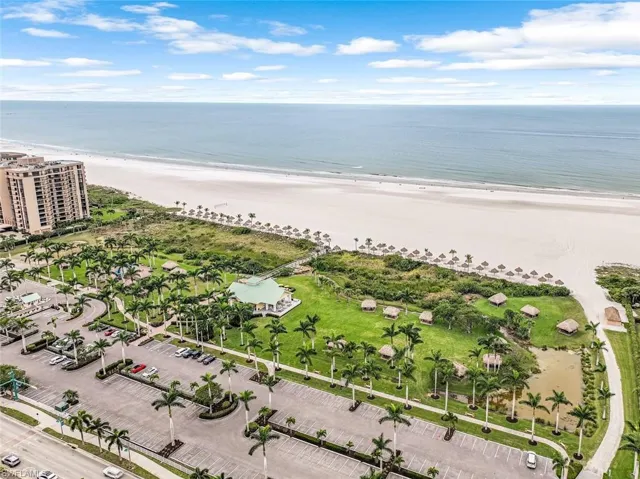 Aerial view with a beach view and a water view