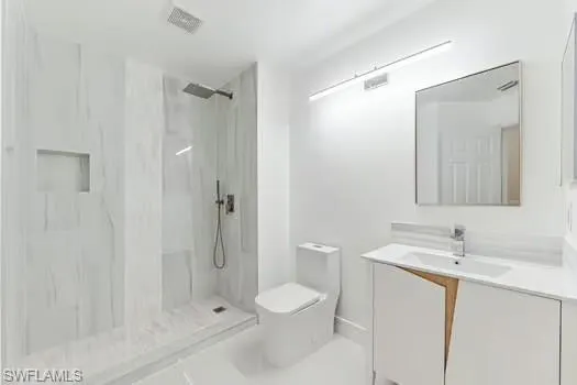 2nd Bathroom with vanity and a walk in shower