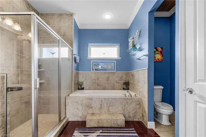 large primary suite, walk-in closet, walk-in shower, soaking tub, linen closet