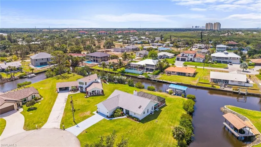 Drone / aerial view featuring a water view and a residential view