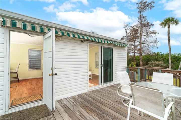 Wooden deck with outdoor dining area