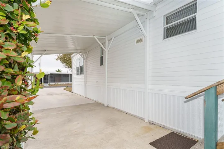 View of patio / terrace with an attached carport