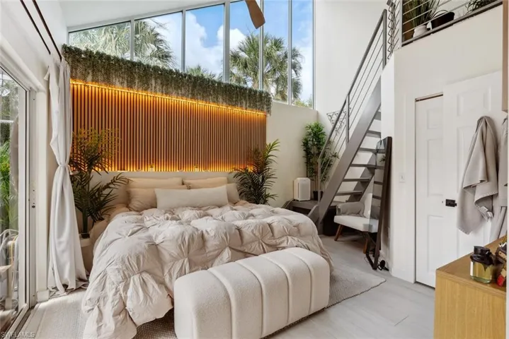 Bedroom featuring multiple windows