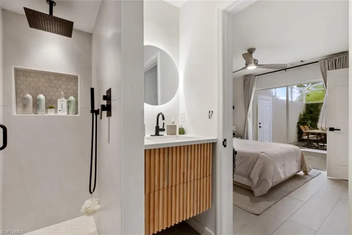 Bathroom featuring sink and shower