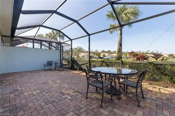 View of patio / terrace with a lanai