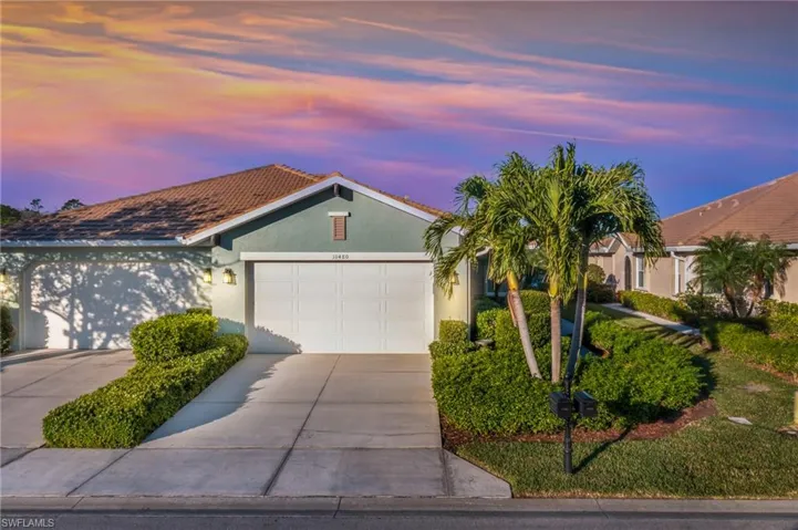 Ranch-style home featuring a garage