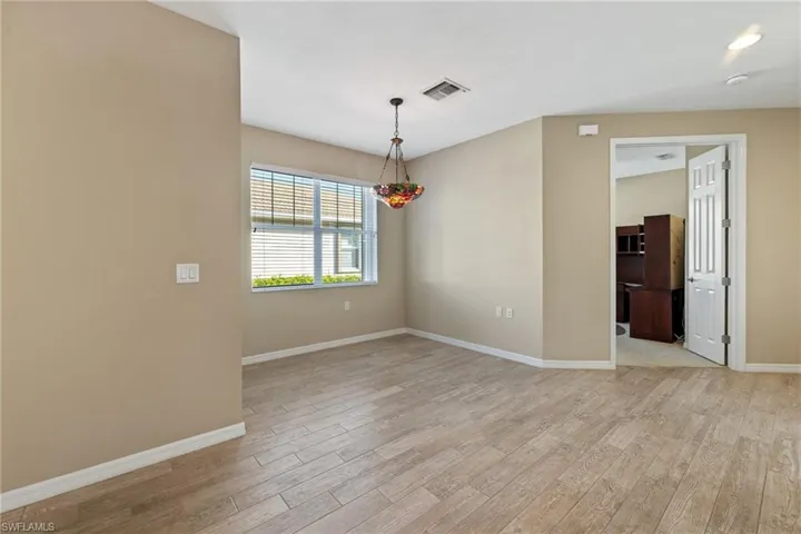 Spare room with light hardwood / wood-style flooring