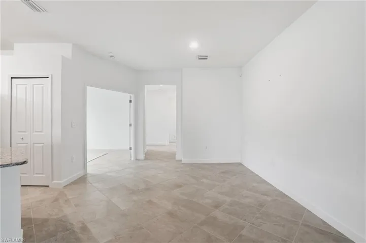 Spare room with baseboards