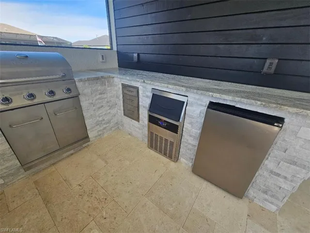View of patio featuring grilling area