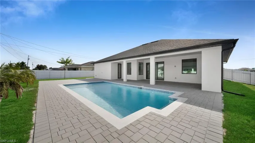 View of pool featuring a patio and a fenced backyard