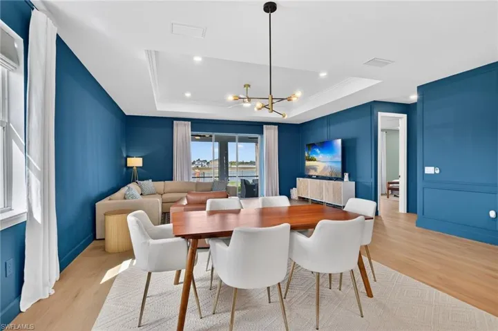 Dining space with decorative chic hanging light fixtures
