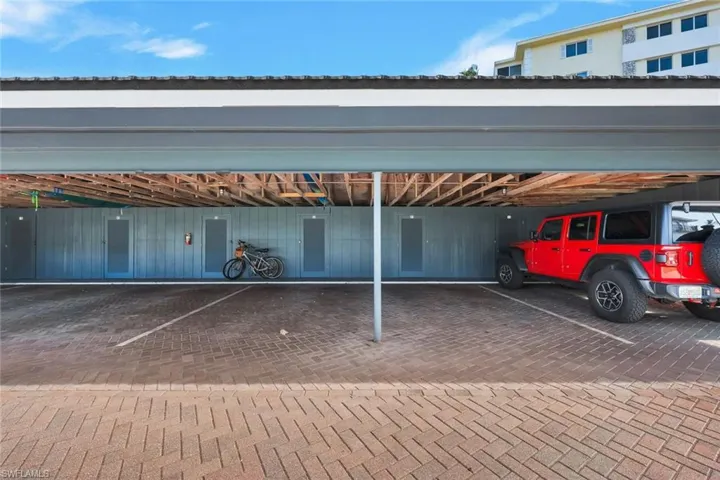 One covered parking space 30 steps to the unit