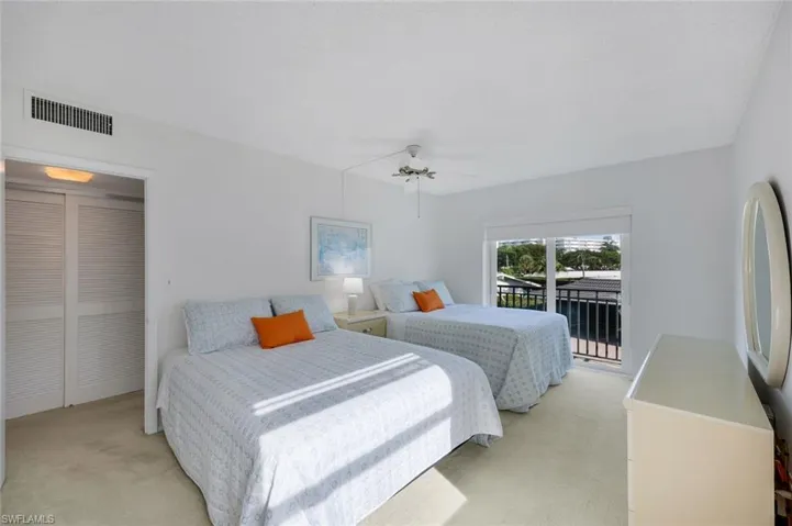 Primary Bedroom with two queen beds and ensuite bathroom