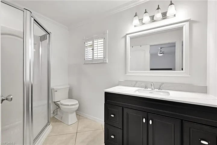 Ensuite primary bathroom features a new vanity and a walk-in shower.