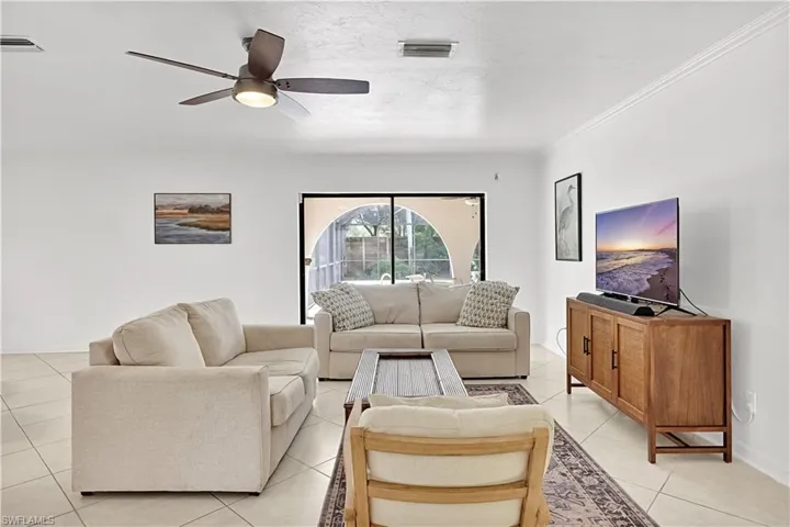 Access the lanai/pool area from the main living area.