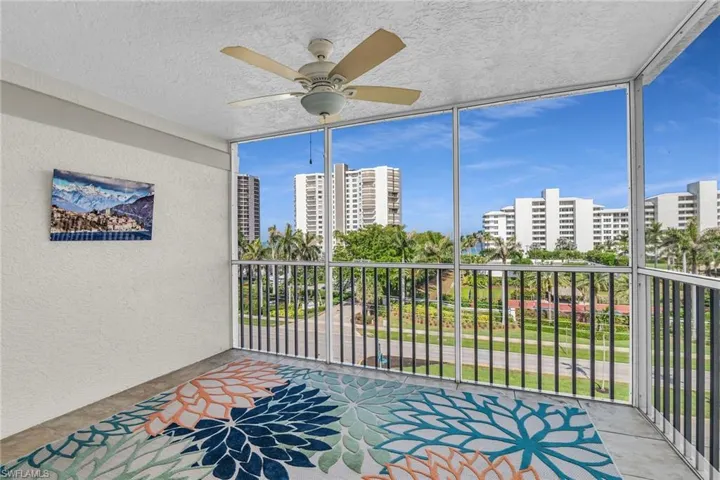 Unfurnished sunroom with a view of city