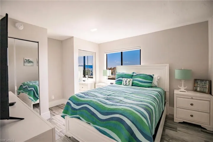 Bedroom featuring wood-type flooring