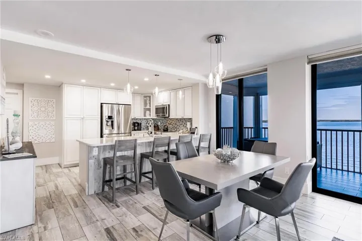 Dining area featuring a water view