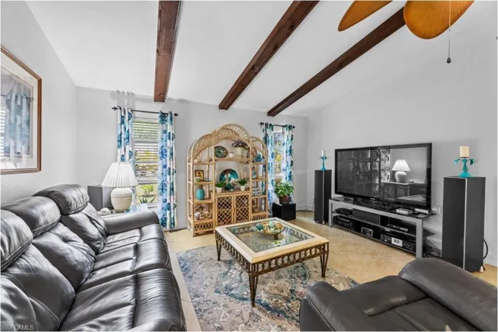 Living area with a ceiling fan