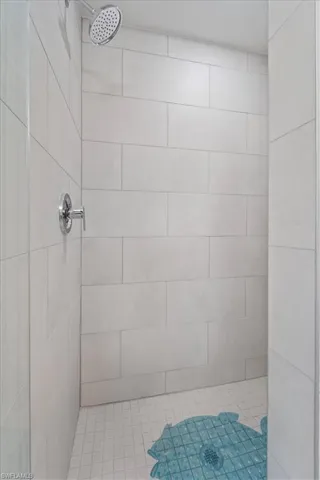 Full bath featuring a stall shower