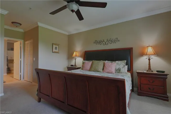 Primary bedroom with a closet and ensuite bath,