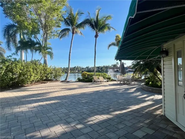View of patio featuring a water view