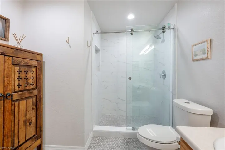 Master Bathroom with Porcelain Shower Surround