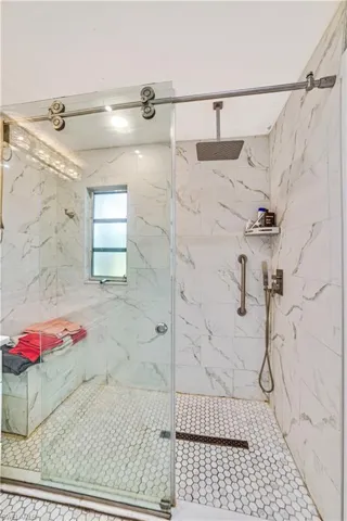 Bathroom featuring an enclosed shower