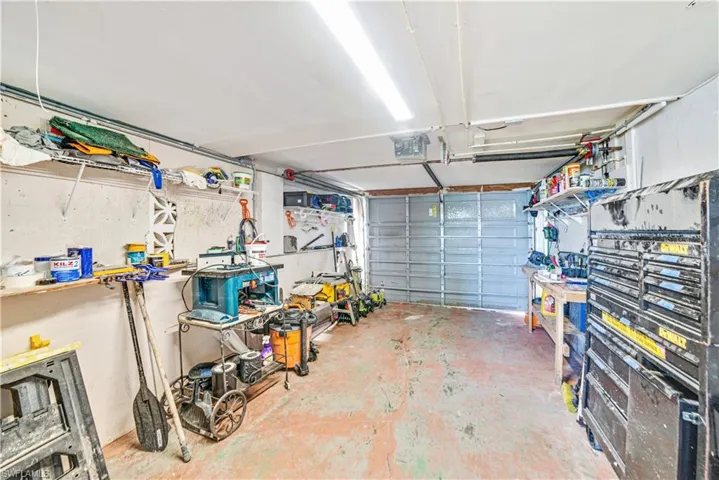 Garage featuring a workshop area