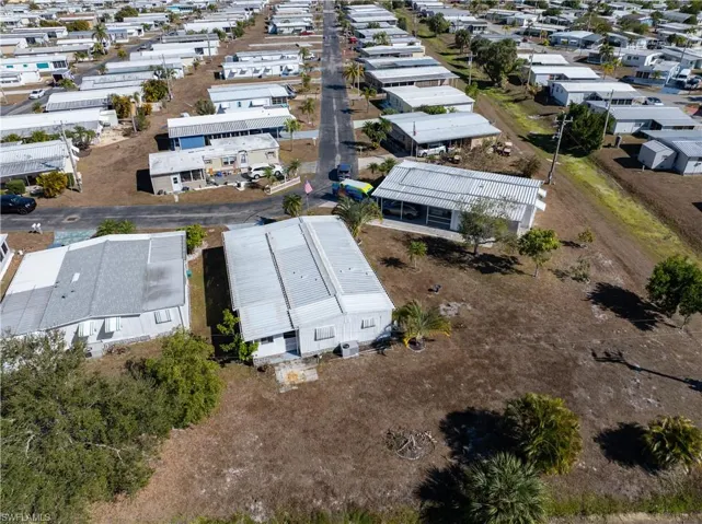 View of property location with nearby suburban area