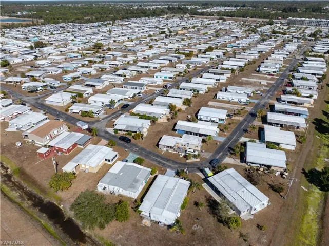View of property location with nearby suburban area