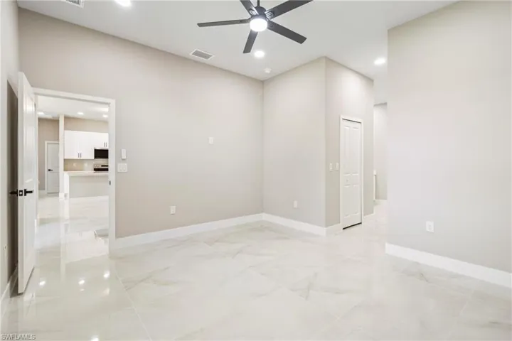 Spare room featuring recessed lighting and ceiling fan