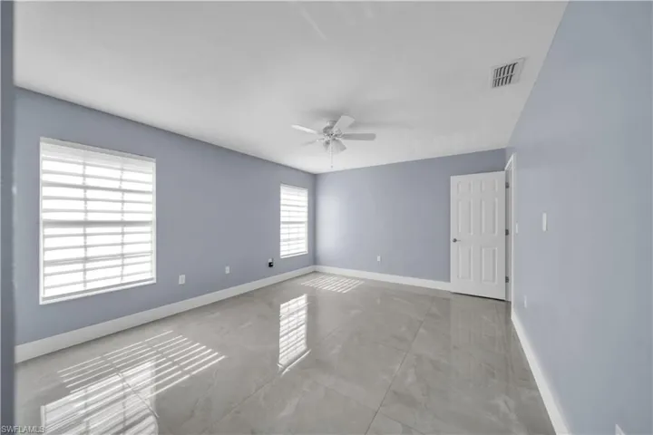 538 Whispering Wind Bend, Lehigh Acres, Florida 33974