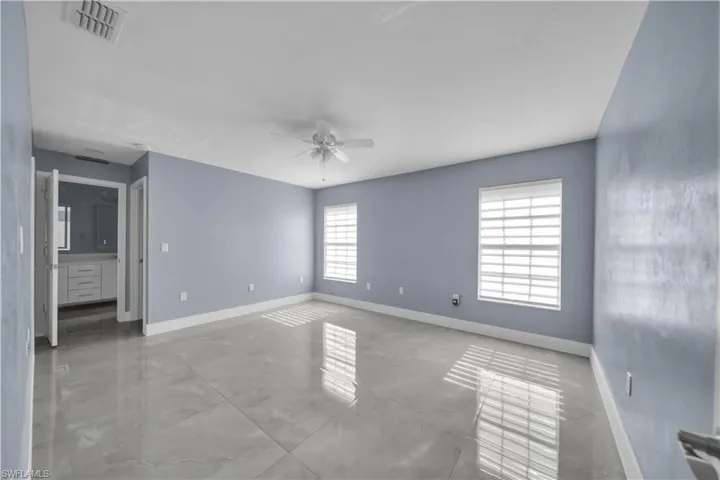 538 Whispering Wind Bend, Lehigh Acres, Florida 33974