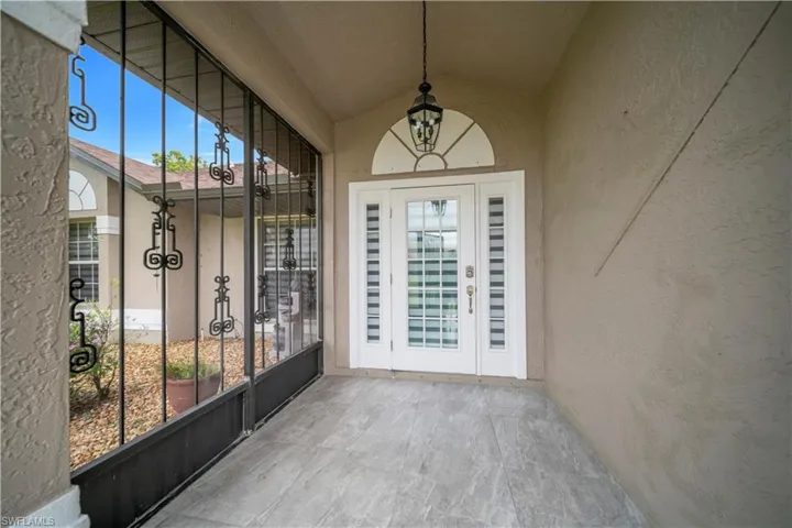 538 Whispering Wind Bend, Lehigh Acres, Florida 33974
