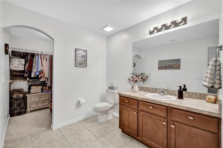 Walk-in closet in the primary bathroom.