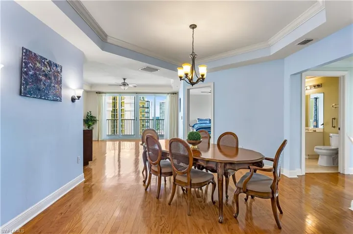 The family dining room, located in front of the kitchen, offers great views of both the living room and kitchen.
