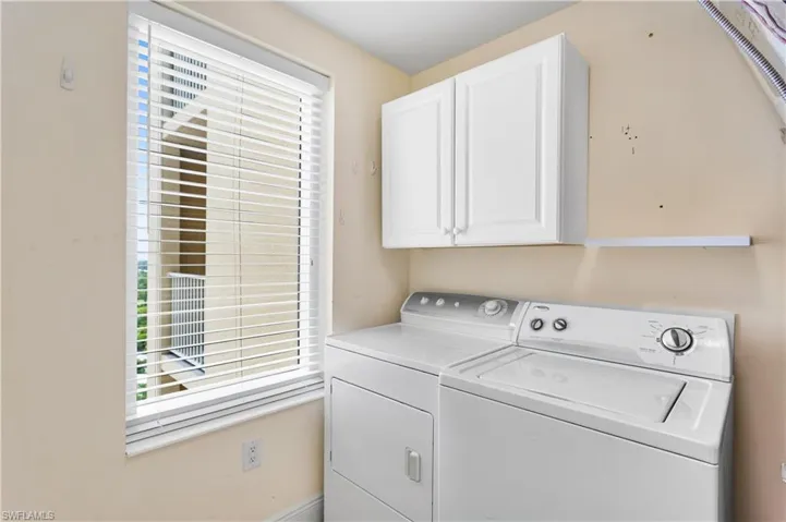 An in-unit laundry room with a washer and dryer is included.