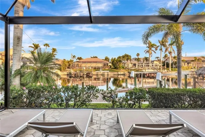 View of patio with a water view