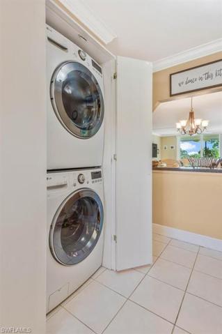 very conveniently located laundry in the kitchen behind closed doors