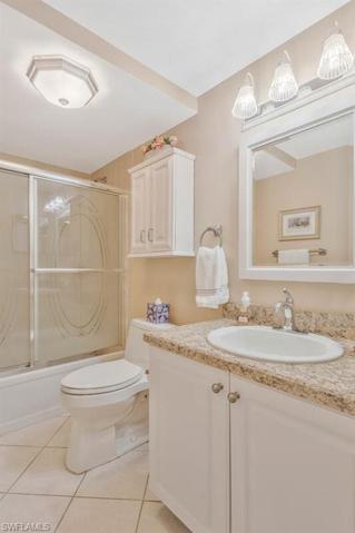 Guest bath is almost an en suite as it is just steps away from guest bedroom  Tub and shower combination