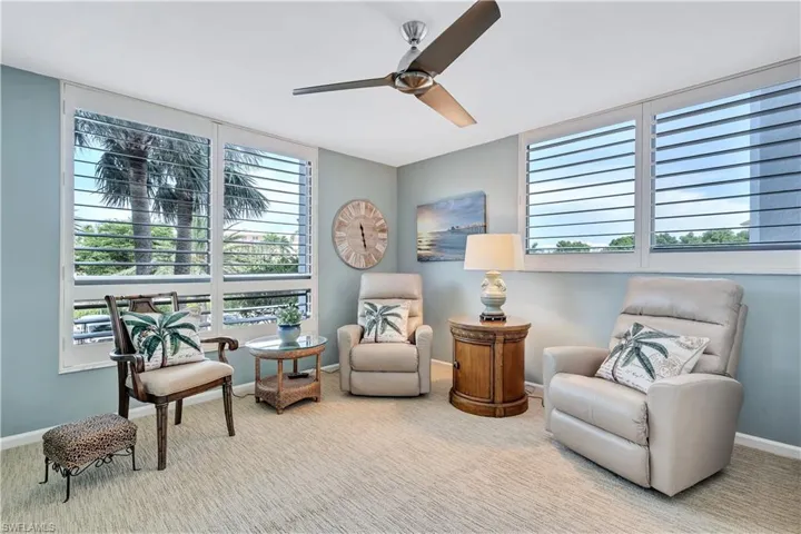 Den with Murphy Bed  and ceiling fan