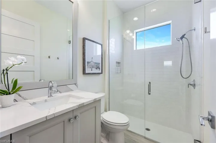 Bathroom featuring a upgraded glass shower
