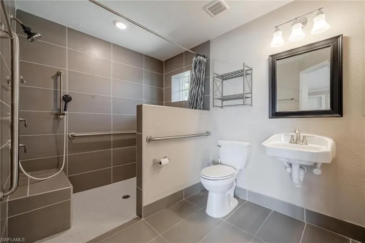 Beautifully remodeled bathroom ADA Accessible