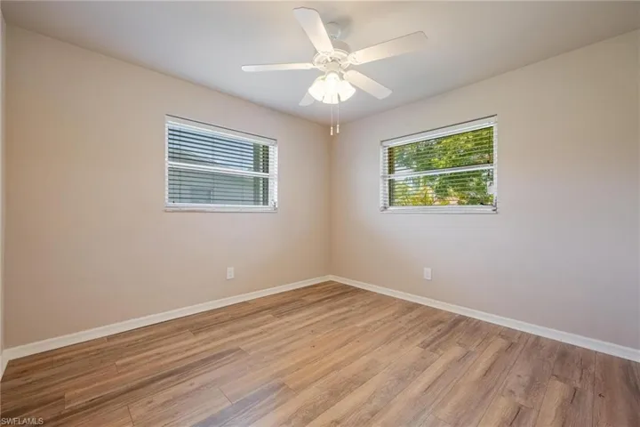 Guest room with vinyl plank flooring