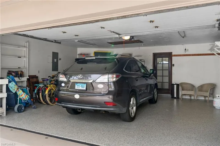 Garage featuring electric panel