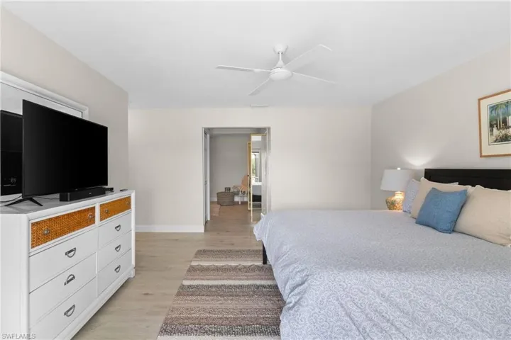 Bedroom featuring light wood finished floors and ceiling fan